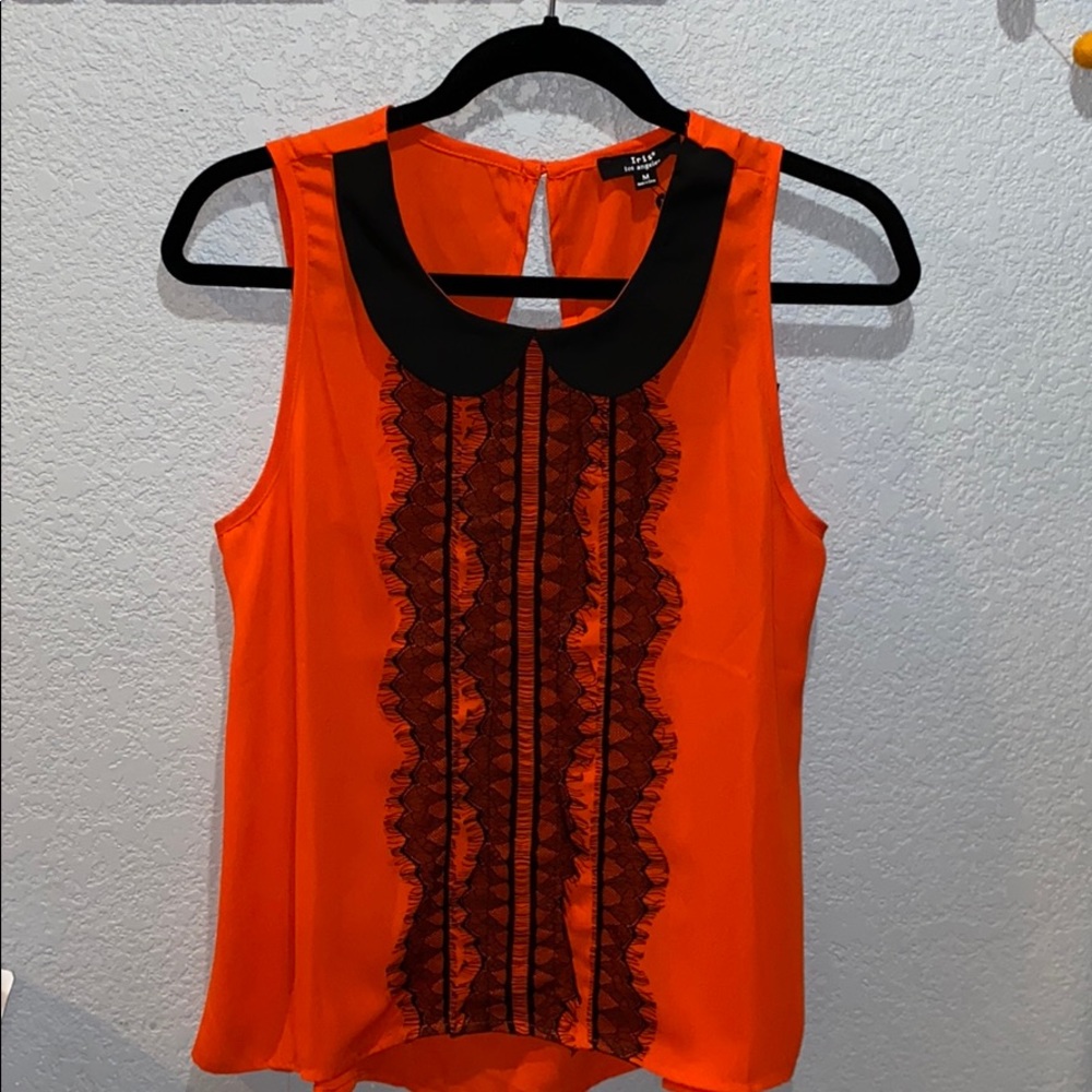 Red/orange Womans blouse.